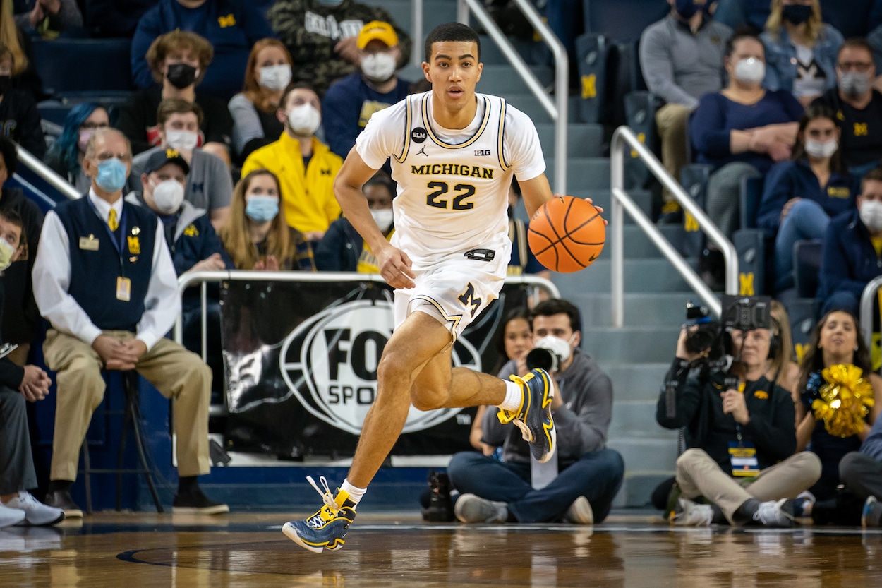 Caleb Houstan dribbles for Michigan.