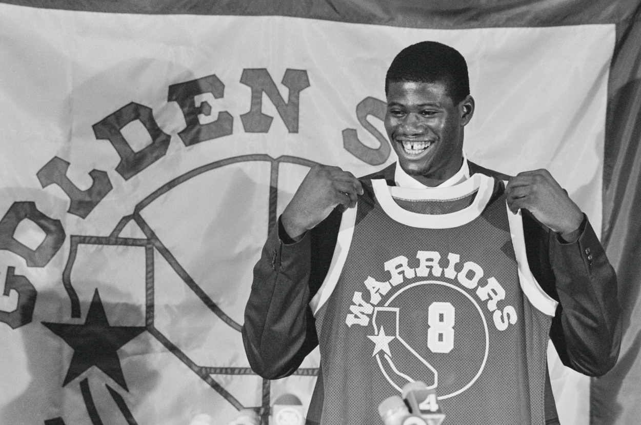 Golden State Warriors top draft pick Chris Washburn, the third player taken in the 1986 NBA Draft, displays his new Warriors jersey.