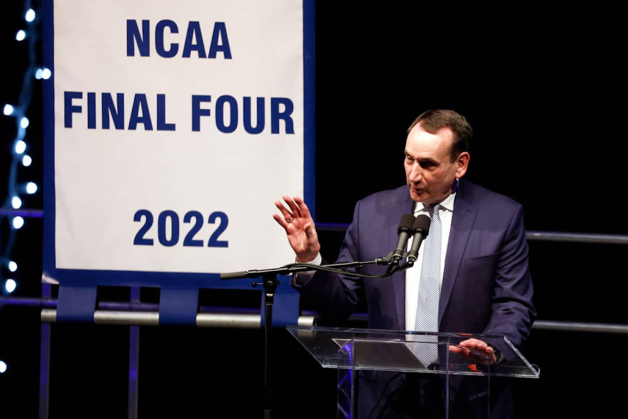 Mike Krzyzewski speaking from a podium.