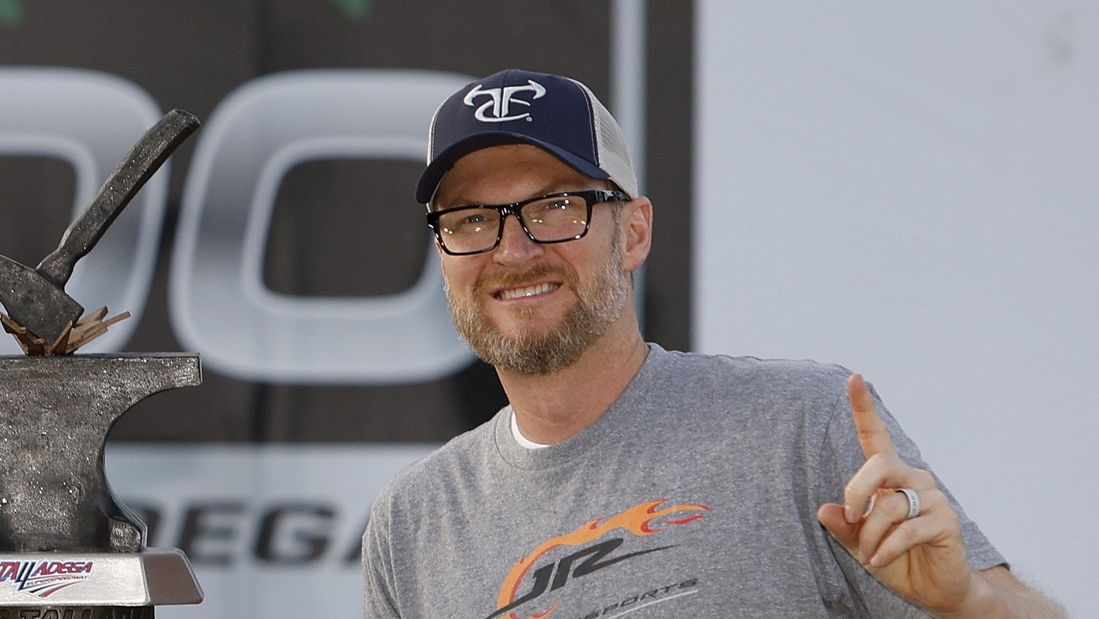 Dale Earnhardt Jr. pose for photos in victory lane after Noah Gragson's win in the NASCAR Xfinity Series Ag-Pro 300 at Talladega Superspeedway on April 23, 2022.