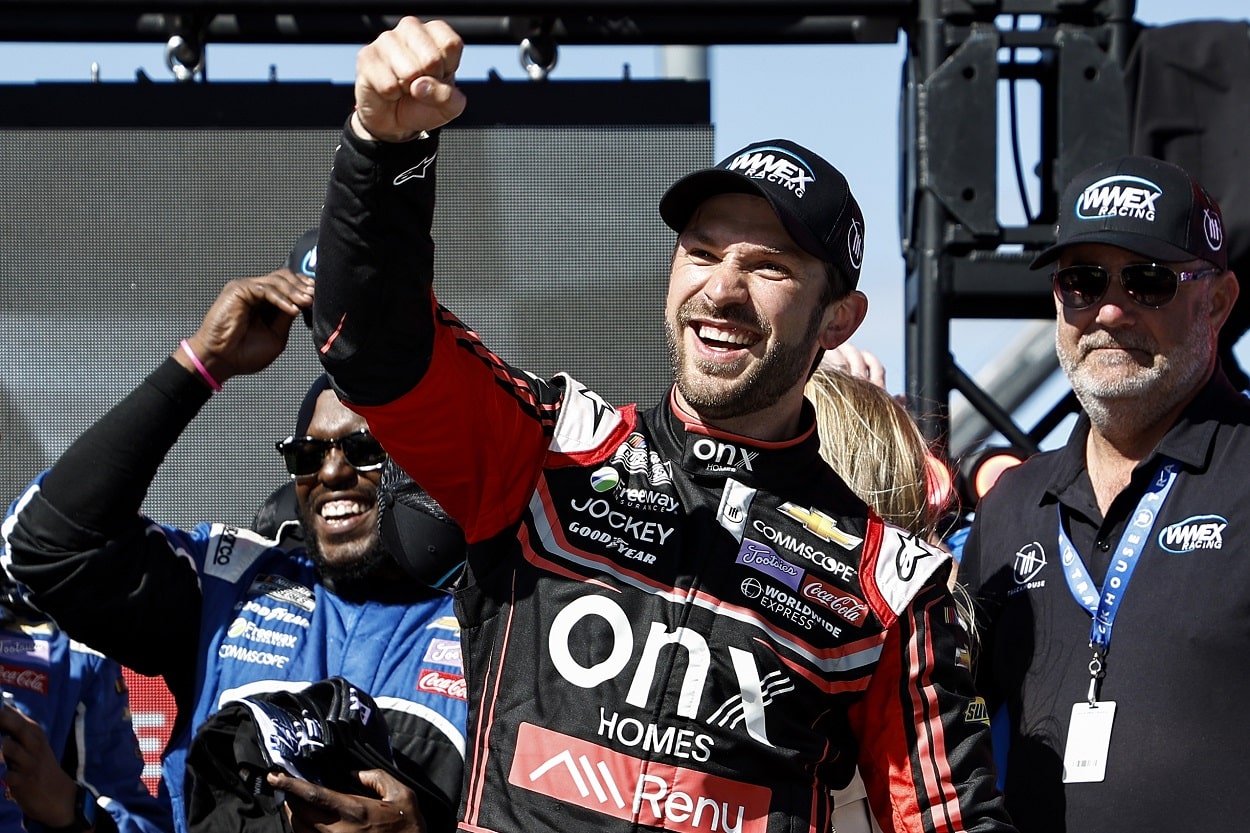 Daniel Suarez celebrates after winning the 2022 NASCAR Cup Series Toyota/Save Mart 350