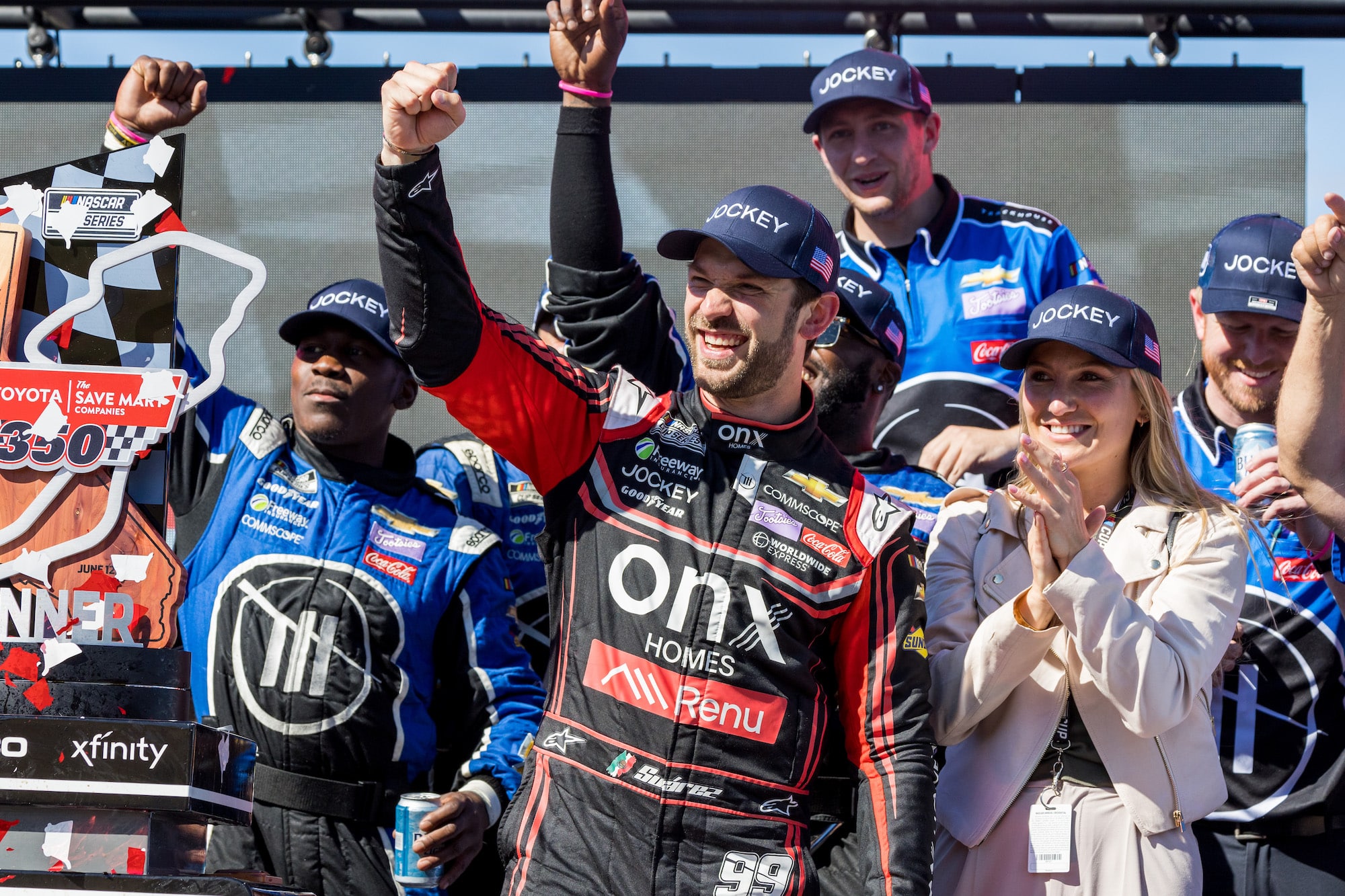 Daniel Suarez celebrates