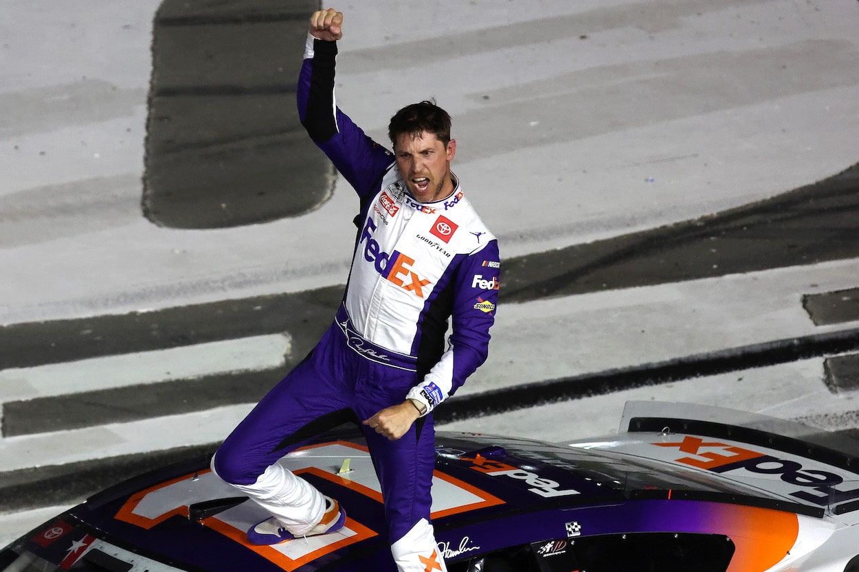 Denny Hamlin celebrates after winning the Coca-Cola 600