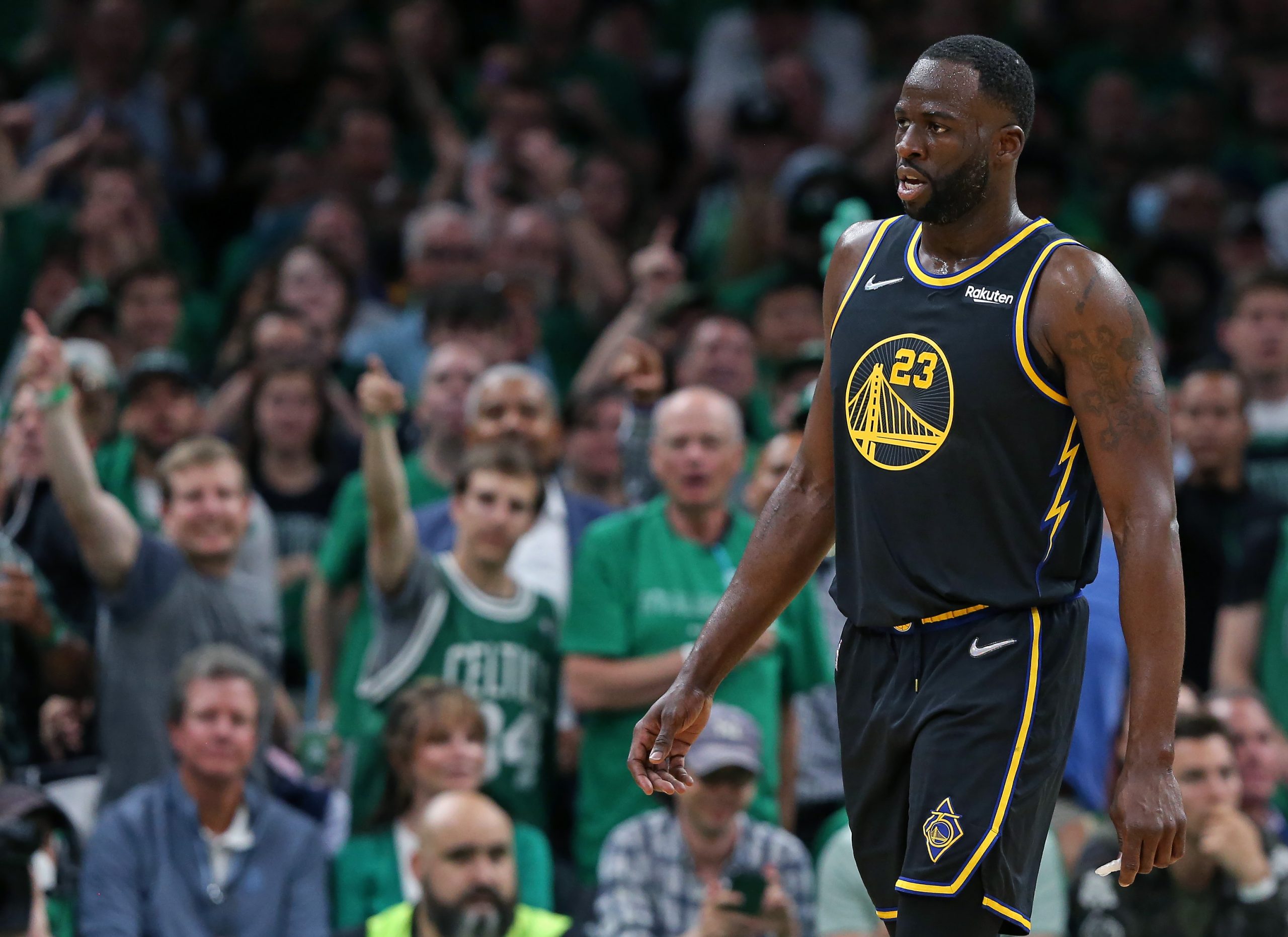 The Warriors Draymond Green (23) hears it from the fans after he committed a fourth-quarter foul.