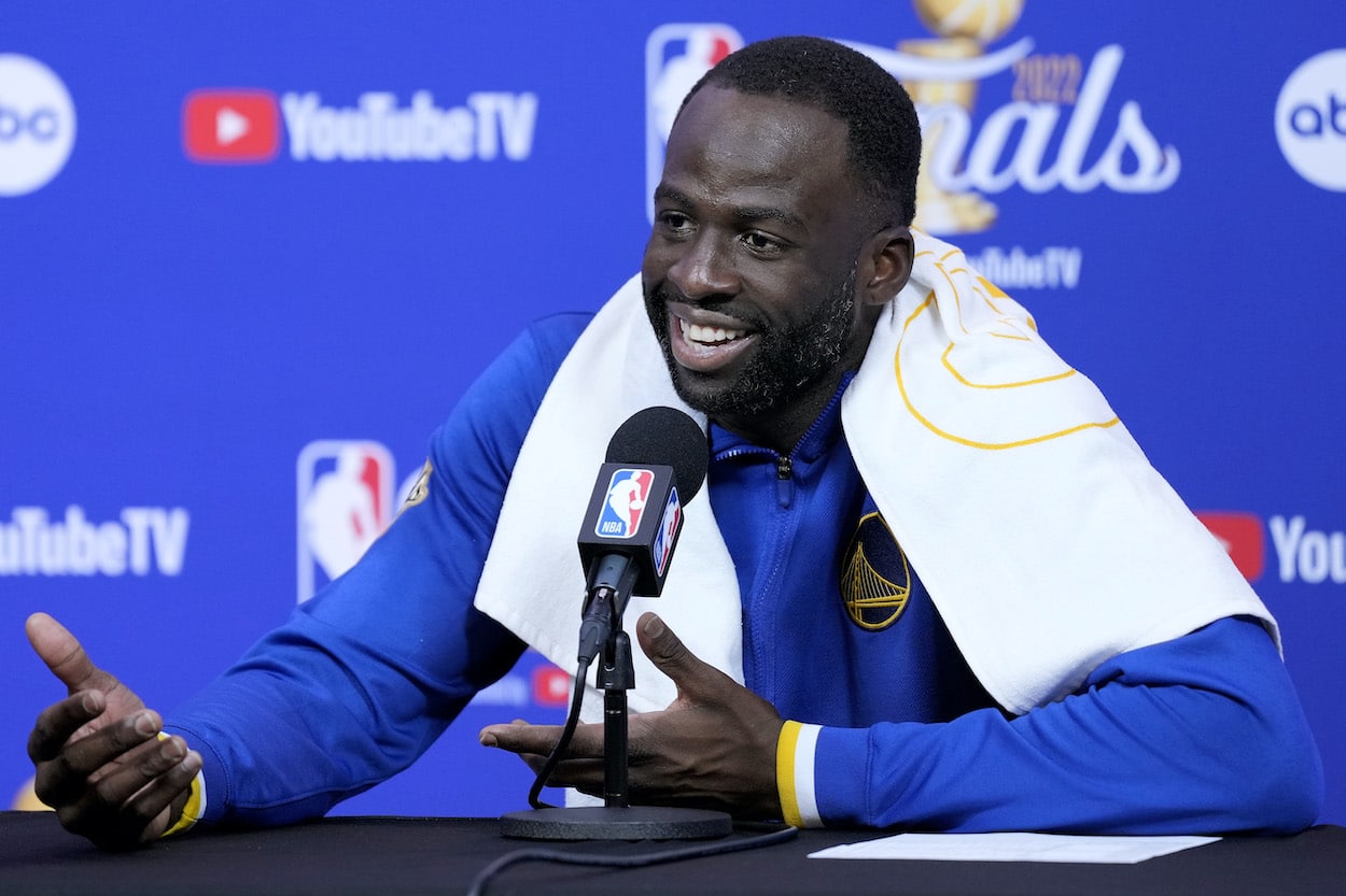 Draymond Green speaks to the media.