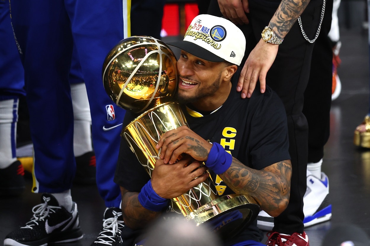 Gary Payton II celebrates after the Warriors won the 2022 NBA Finals