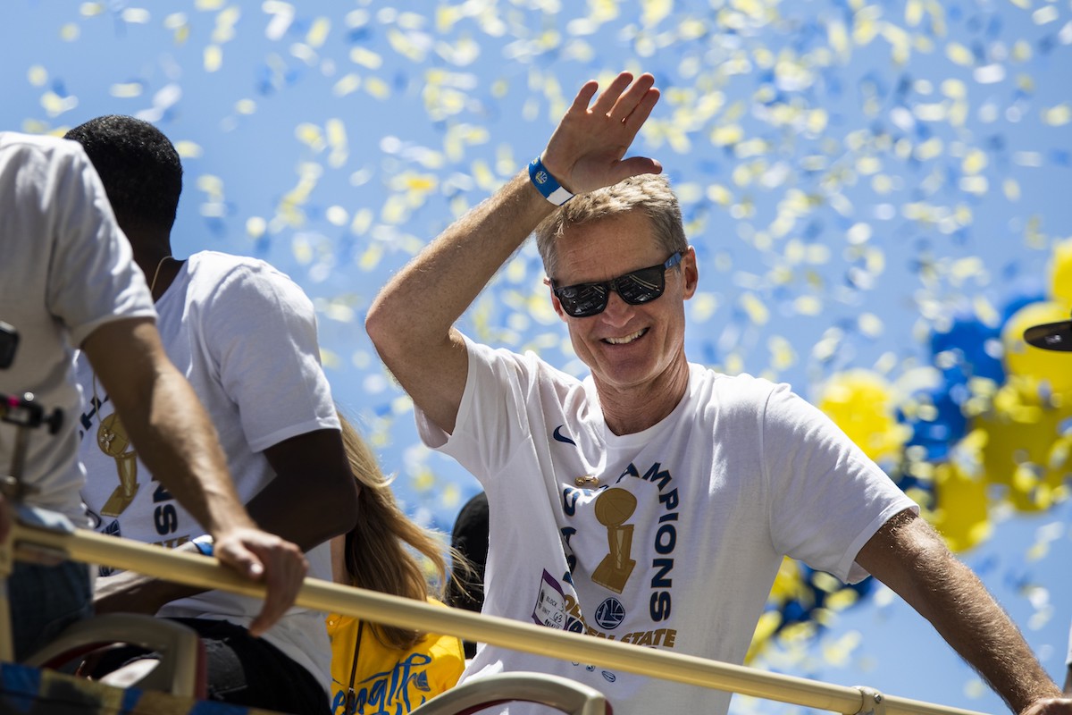 Head Coach Steve Kerr of the Golden State Warriors greets the crowd during the 2018 NBA Championship Victory Parade