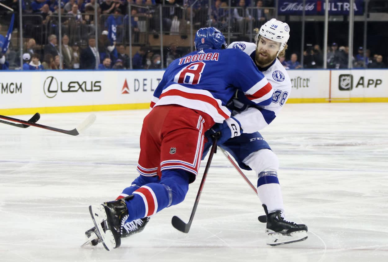 New York Rangers defenseman Jacob Trouba throws a hit against the Tampa Bay Lightning.