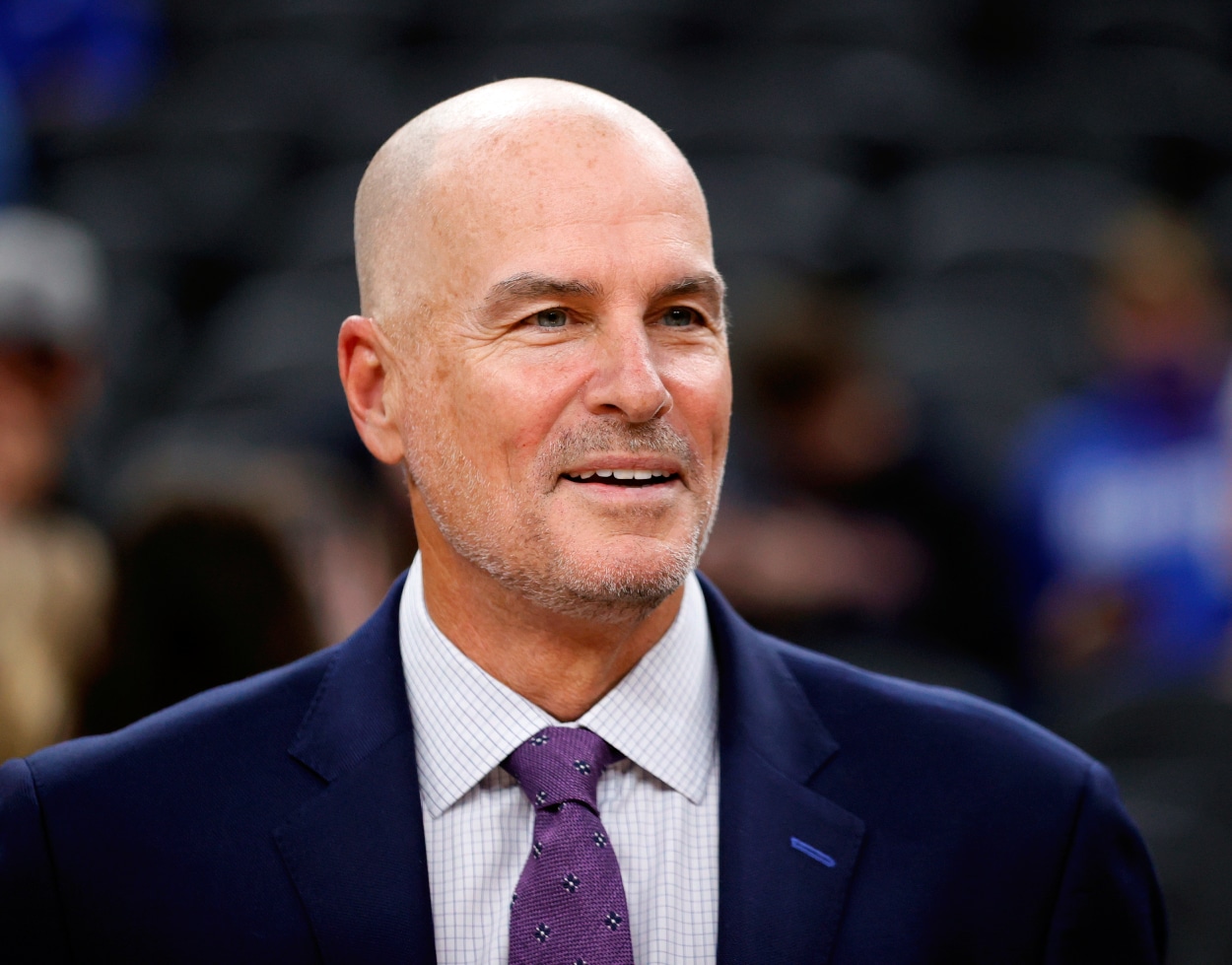 ESPN college basketball analyst Jay Bilas stands on the court.