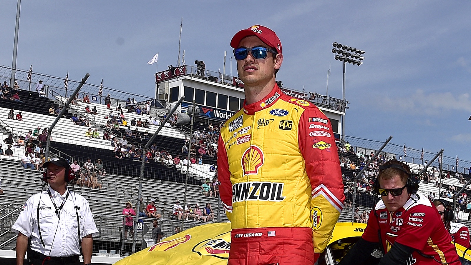 Joey Logano walks the grid during qualifying for the NASCAR Cup Series Enjoy Illinois 300 at WWT Raceway on June 4, 2022.