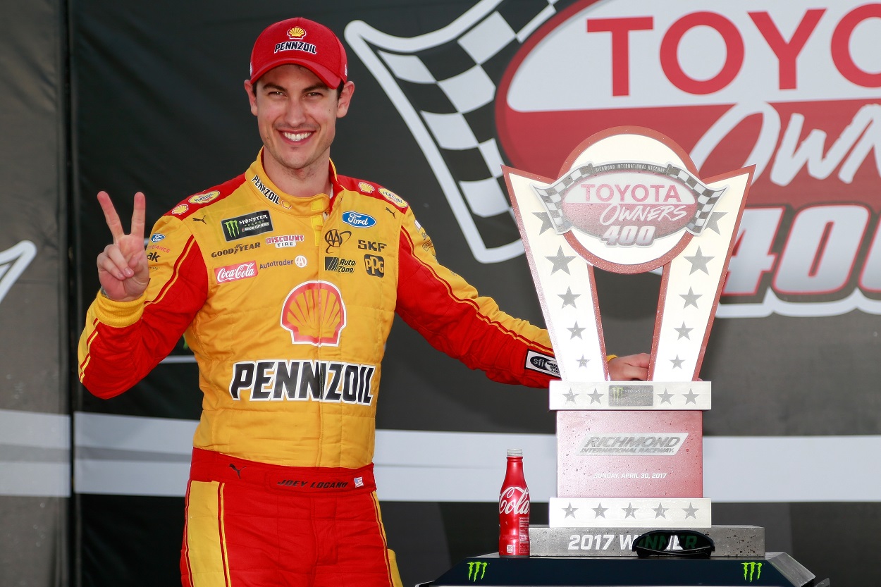 Joey Logano celebrates after winning the 2017 NASCAR Cup Series Toyota Owners 400 at Richmond Raceway