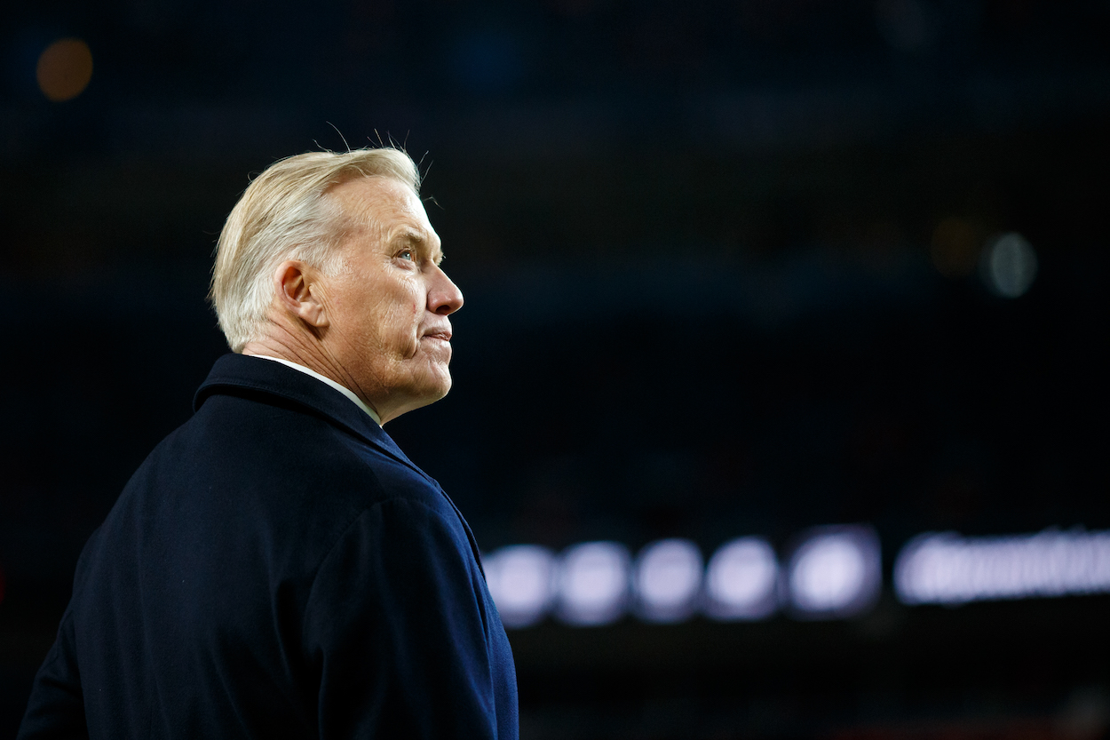 John Elway looks on during a Broncos game.