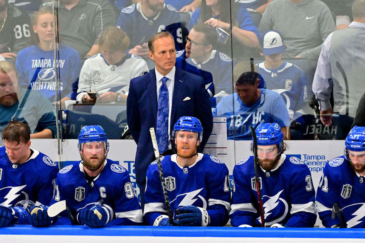 Tampa Bay Lightning head coach Jon Cooper stands on the bench.