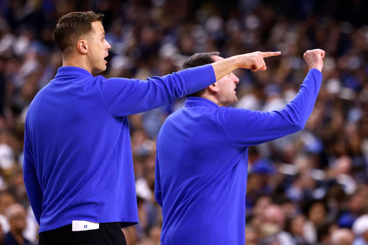 Jon Scheyer (L) and Mike Krzyzewski (R) during a Duke game.