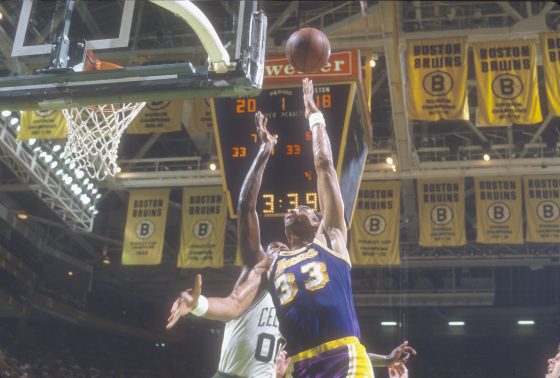 Kareem Abdul-Jabbar of the Los Angeles Lakers shoots over Robert Parish of the Boston Celtics.