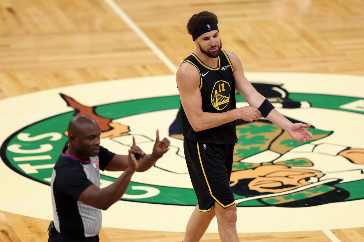 Klay Thompson of the Golden State Warriors reacts to a call by referee Courtney Kirkland.