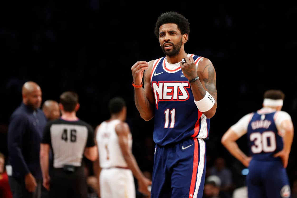 Kyrie Irving reacts during a Brooklyn Nets game.