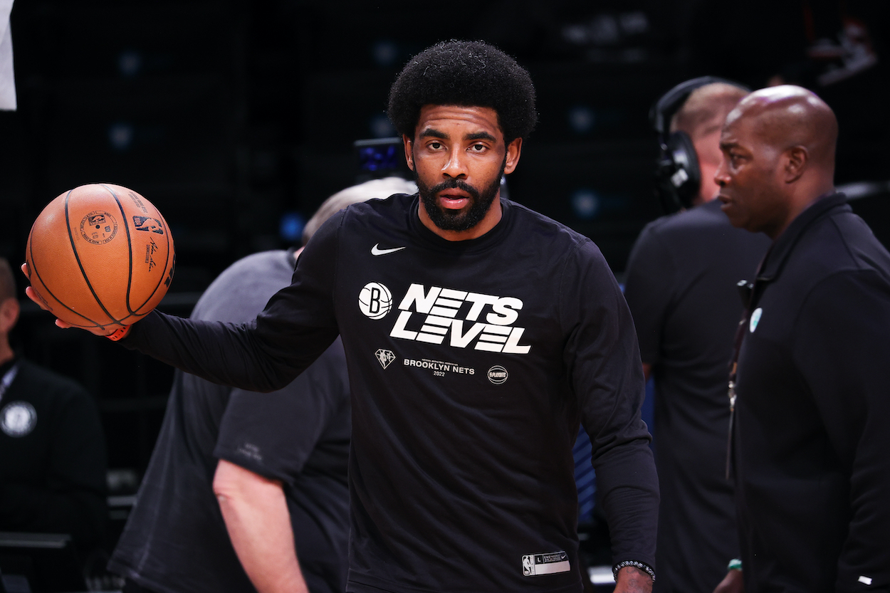 Kyrie Irving of Brooklyn Nets warms up before NBA playoff game.