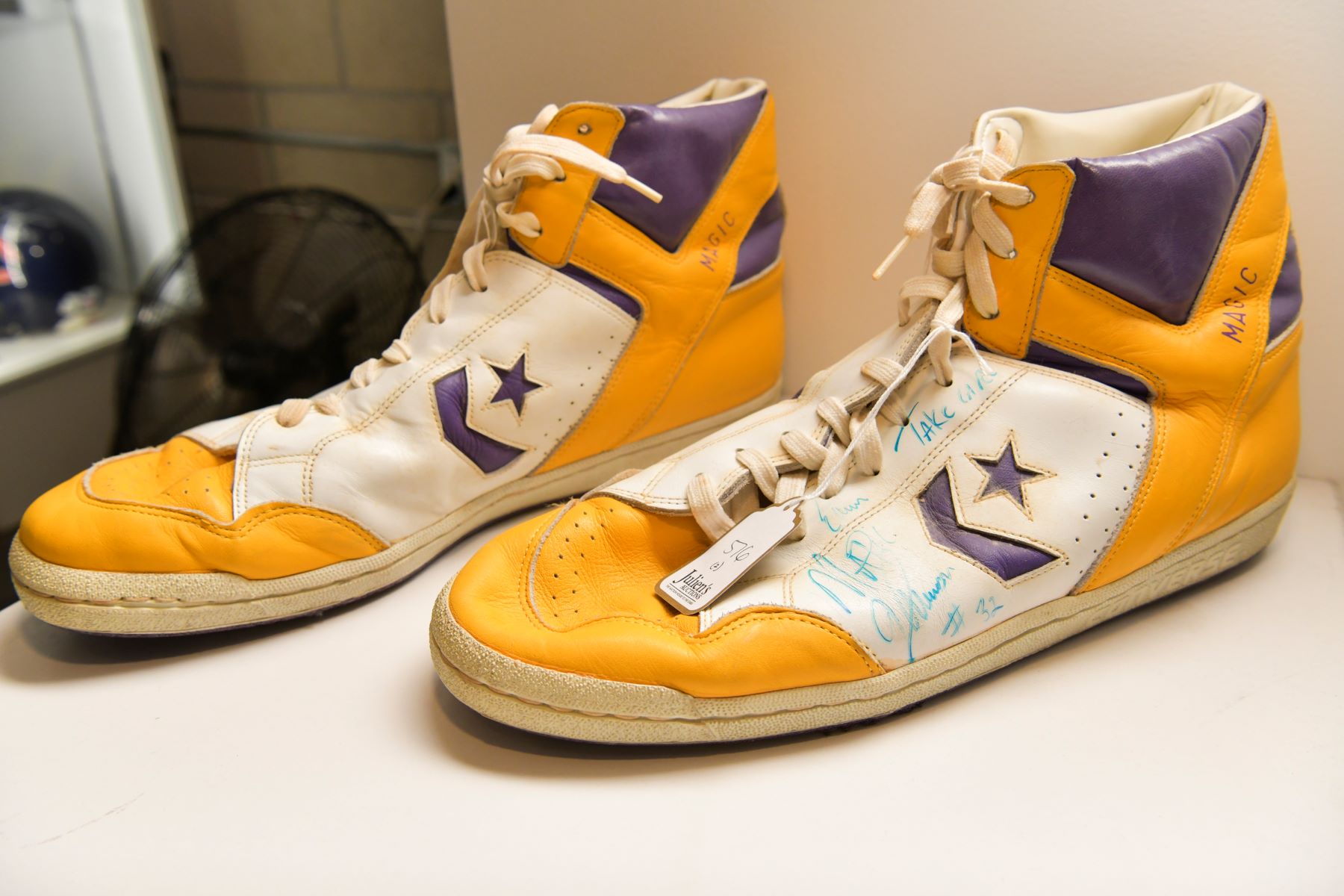A signed pair of Magic Johnson's Los Angeles Lakers Converse shoes at Julien's Auctions Gallery