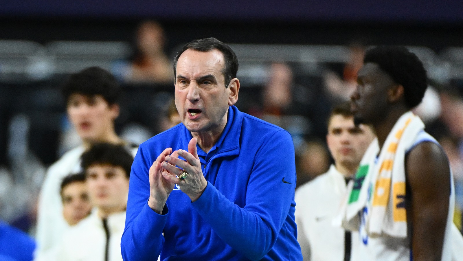 Mike Krzyzewski of the Duke Blue Devils cheers on his team as they take on the North Carolina Tar Heels in the semifinal game of the 2022 NCAA Men's Basketball Tournament Final Four on April 2, 2022, in New Orleans.