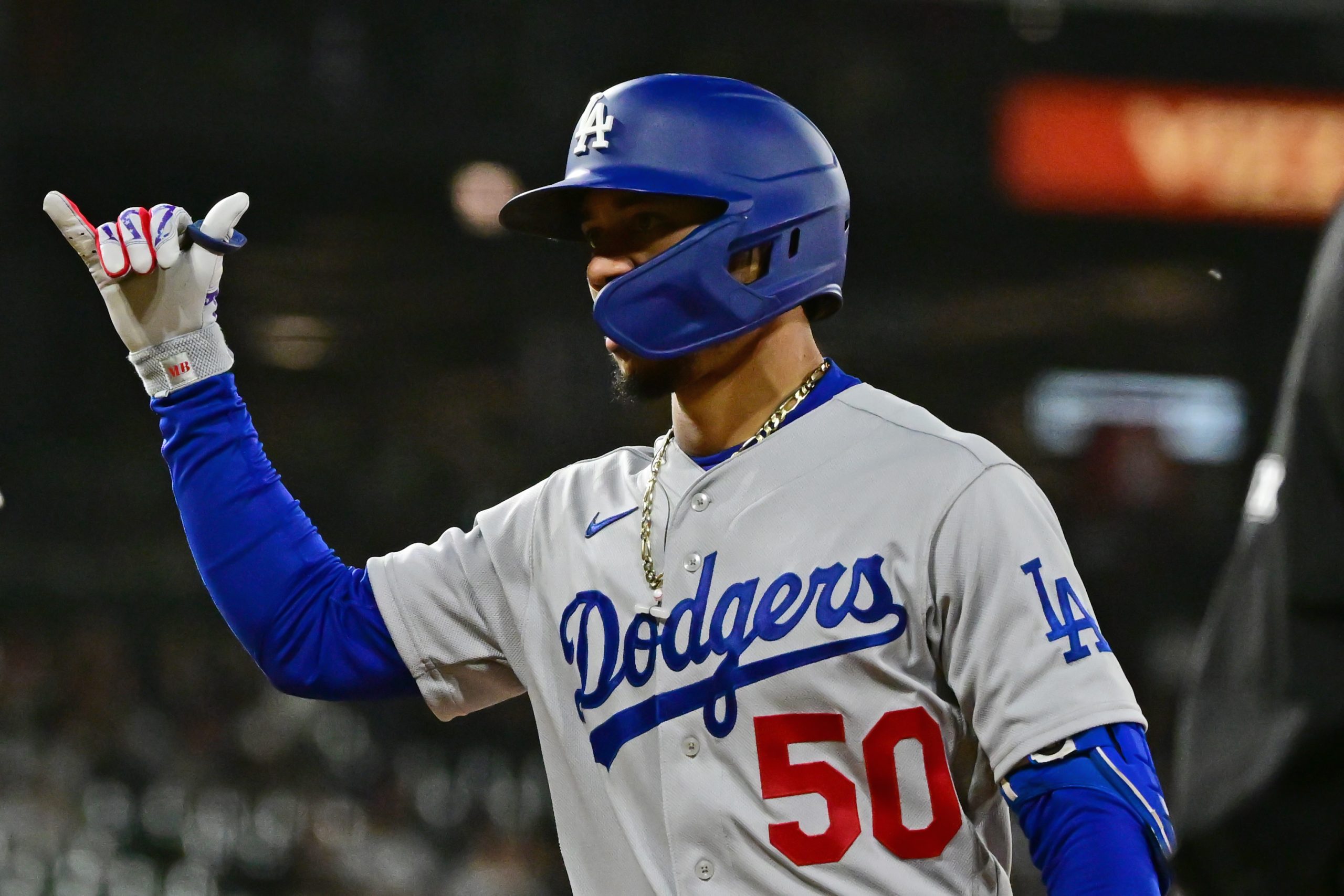 Mookie Betts of the Los Angeles Dodgers reacts after his single in the ninth inning against the Chicago White Sox.