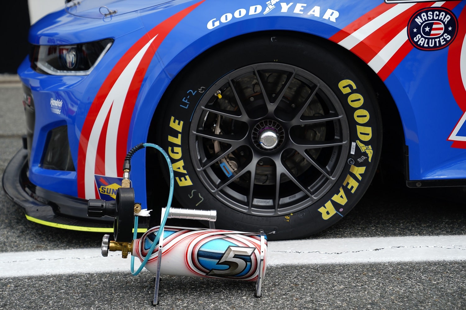 Tire inflation tool with single-hub tire on the Kyle Larson No. 5 Chevrolet on pit road prior to the DuraMAX Drydene 400 NASCAR Cup Series race on May 1, 2022, at Dover Motor Speedway.