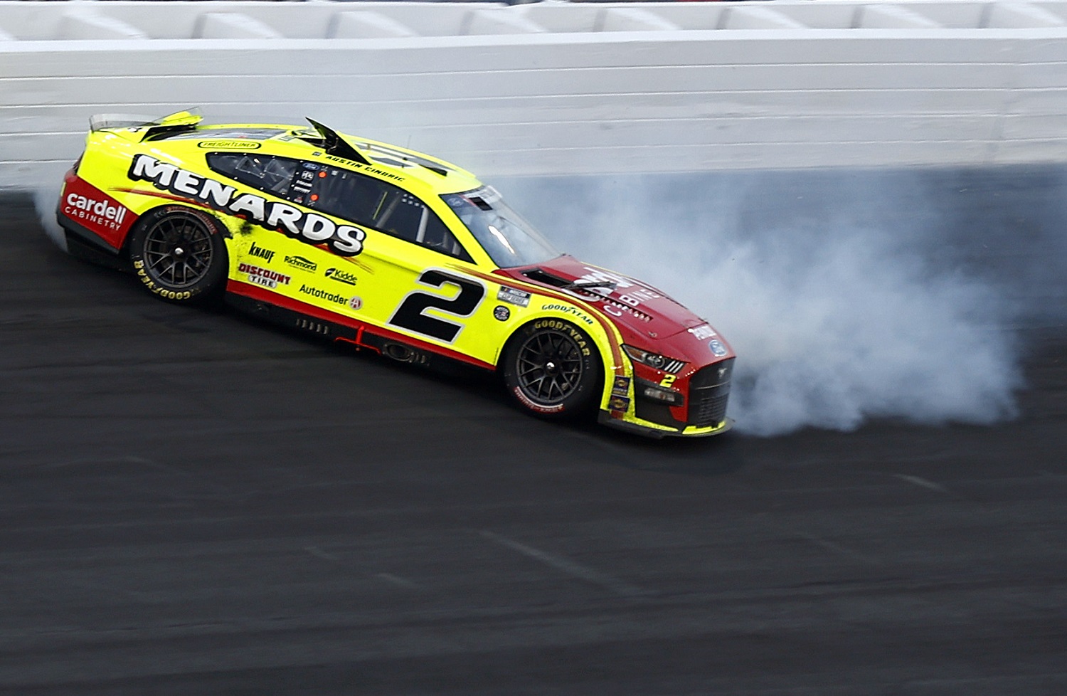 Austin Cindric spins after an on-track incident during the NASCAR Cup Series Coca-Cola 600 at Charlotte Motor Speedway on May 29, 2022.