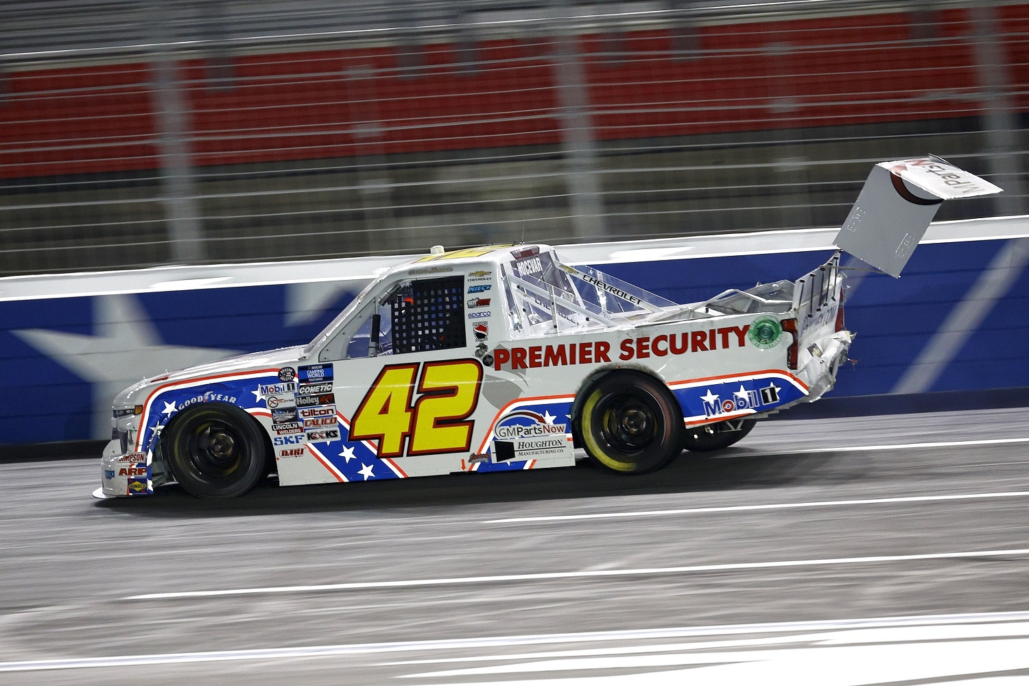 Carson Hocevar drives a damaged truck after an on-track incident during the NASCAR Camping World Truck Series North Carolina Education Lottery 200 at Charlotte Motor Speedway on May 27, 2022.