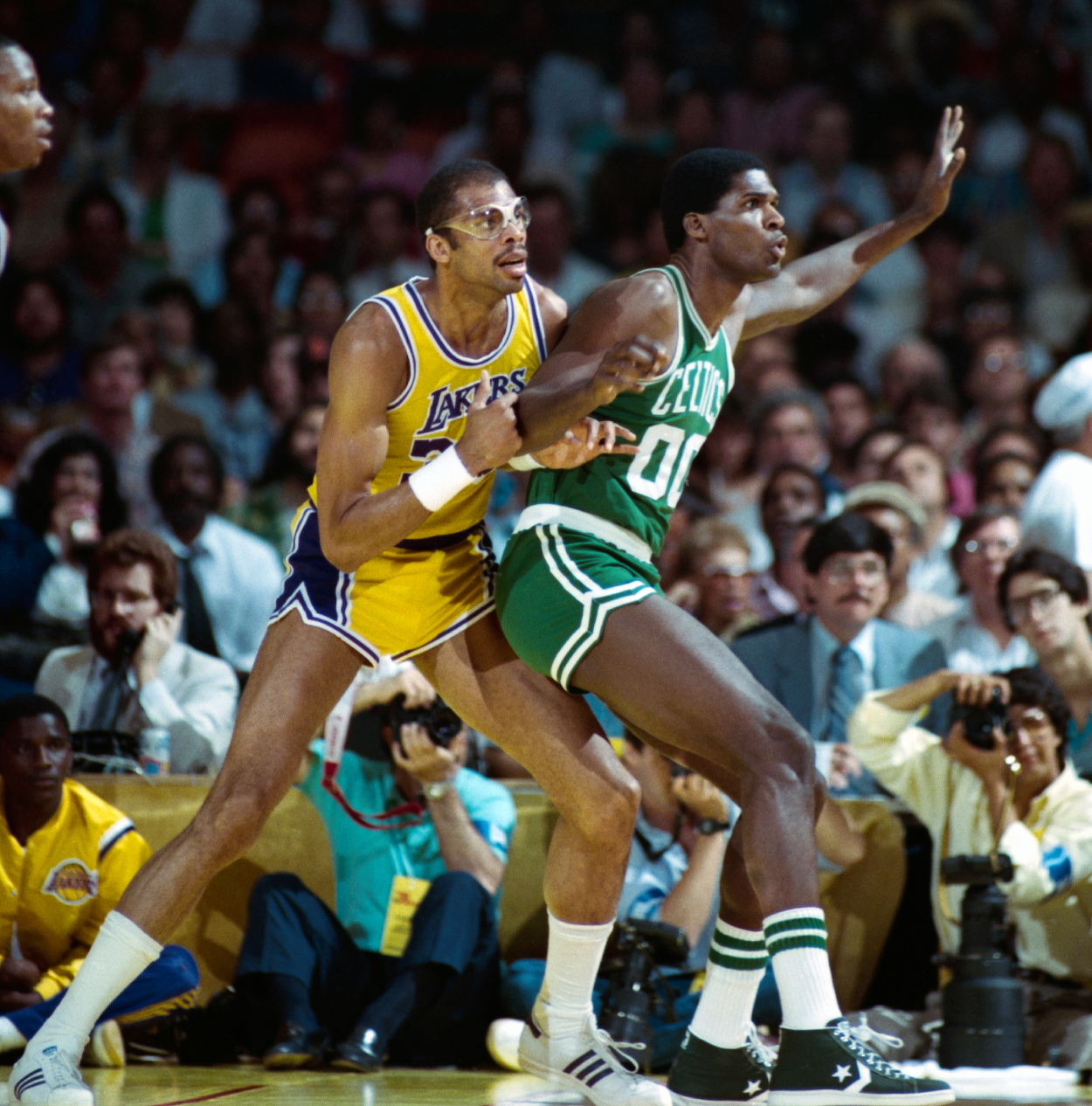 Los Angeles Lakers Kareem Abdul-Jabbar battles Boston Celtics Robert Parish during 1985 NBA Finals.