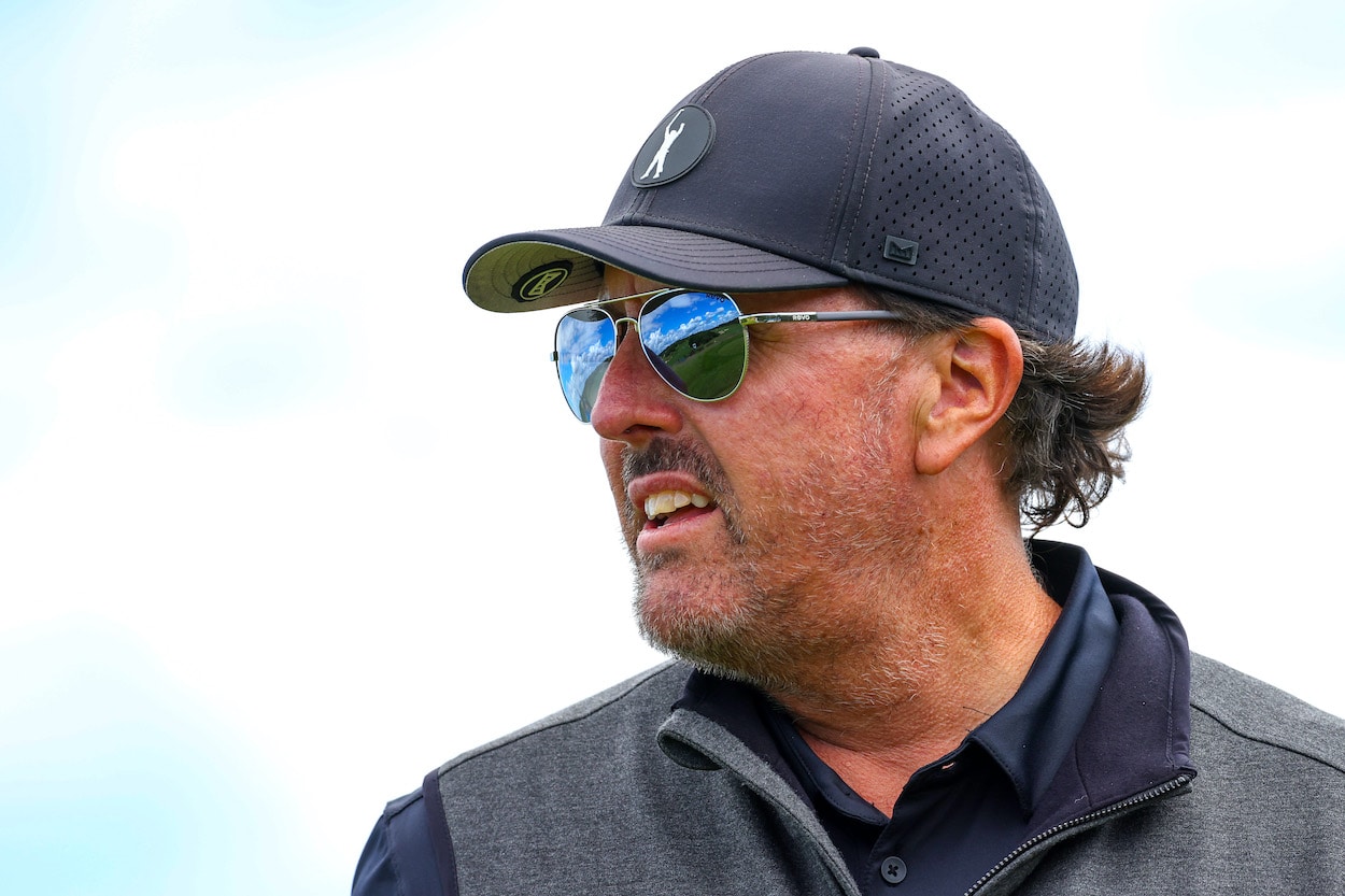 Phil Mickelson looks on during a practice round.