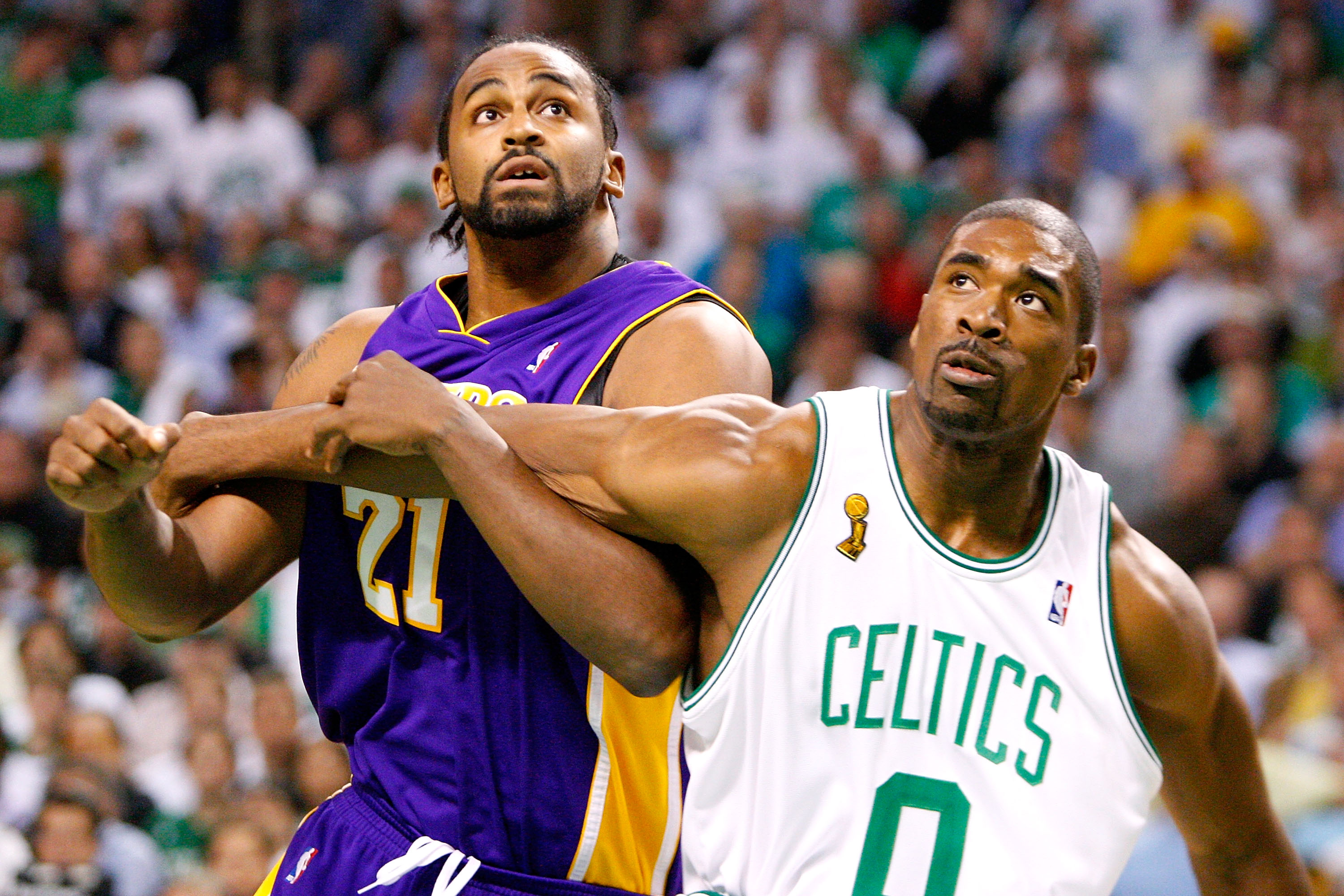 Ronny Turiaf of the Los Angeles Lakers and Leon Powe of the Boston Celtics battle for position.