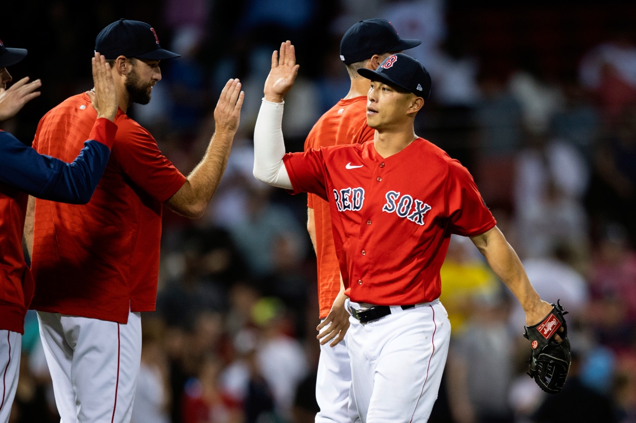 Rob Refsnyder of the Boston Red Sox celebrates a victory against the Oakland Athletics.