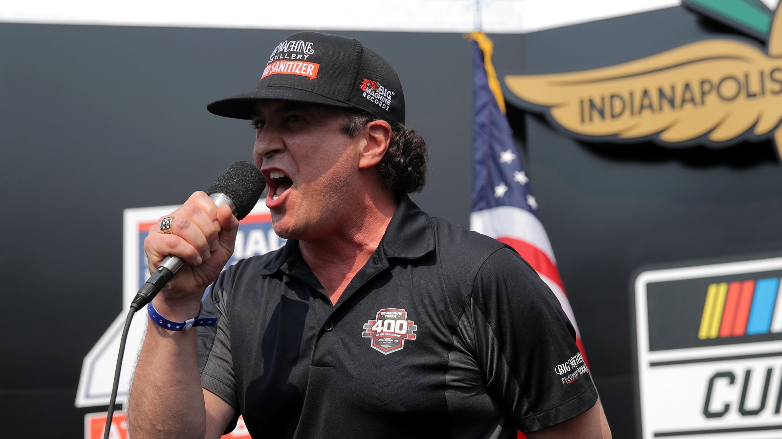 Scott Borchetta gives the command to start engines prior to the NASCAR Cup Series Big Machine Hand Sanitizer 400 at Indianapolis Motor Speedway on July 5, 2020.