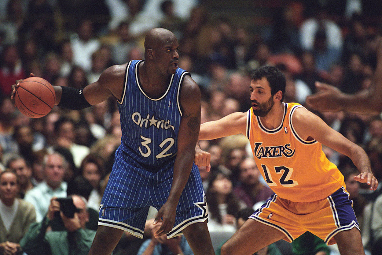 Shaquille O'Neal (L) in action for the Orlando Magic.