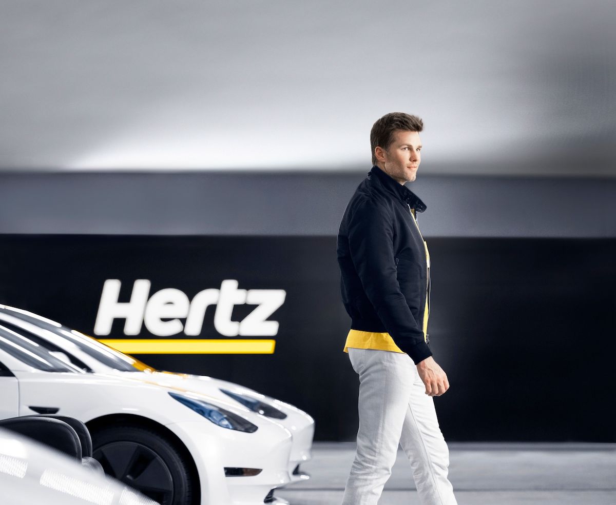 Seven-time Super Bowl champion Tom Brady recharges his car at Hertz