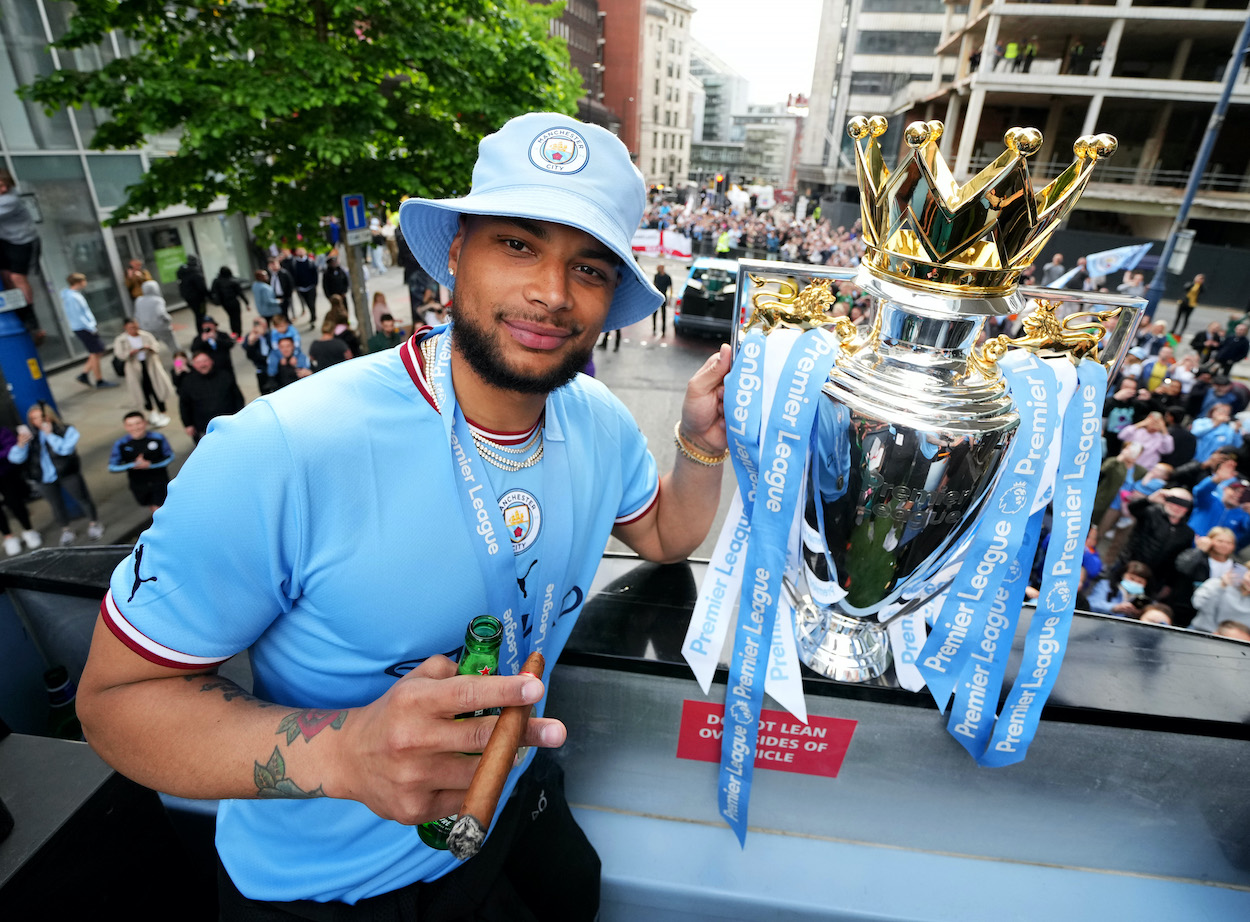 Zack Steffen of Manchester City celebrates with the Premier League trophy. The goalkeeper is now looking for a loan to boost his standing with the USMNT ahead of the 2022 World Cup.
