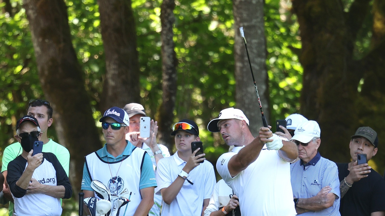 Bryson DeChambeau plays his second shot on the second hole during the LIV Golf Invitational on June 30, 2022, in North Plains, Oregon.