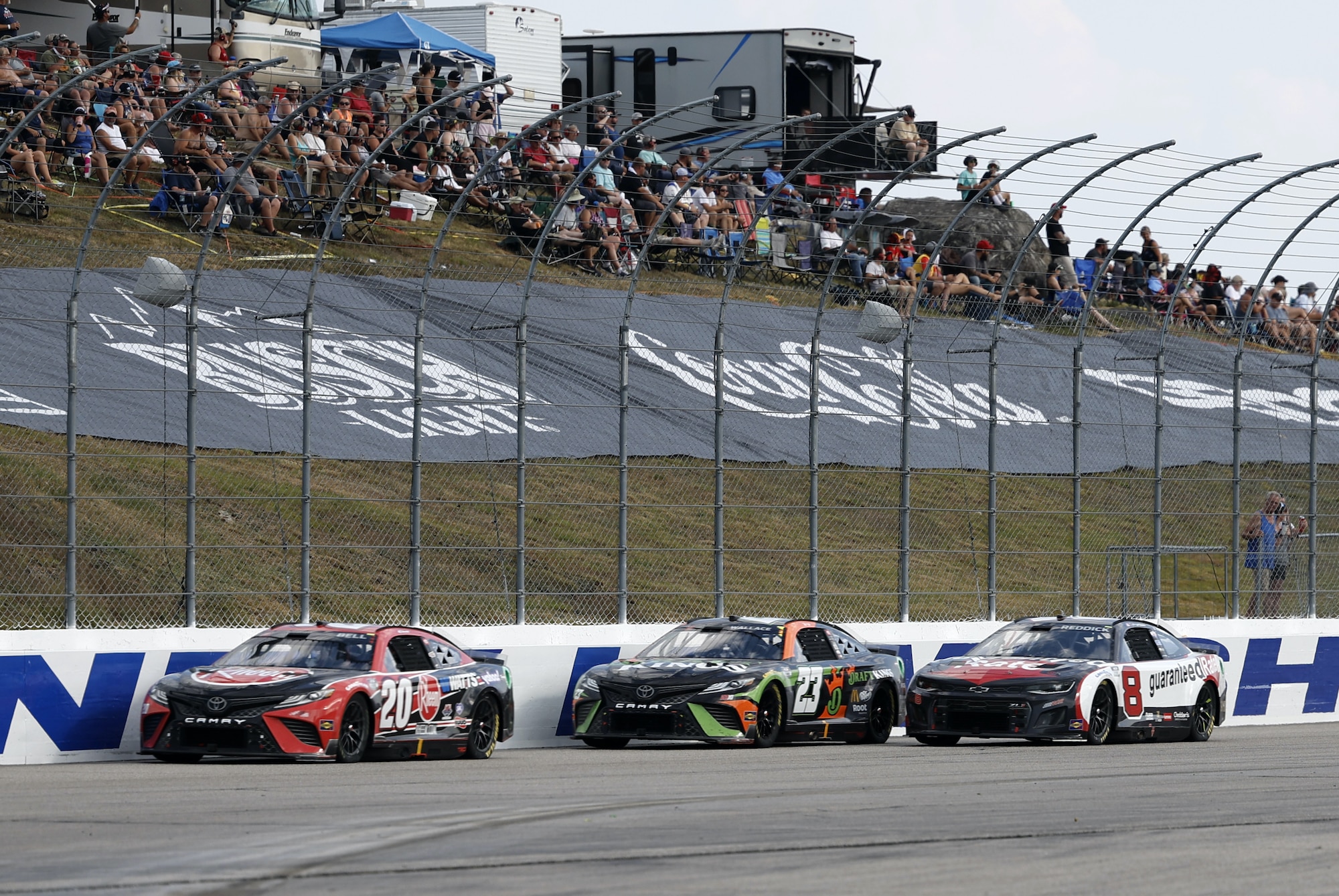 Bubba Wallace and Christopher Bell race