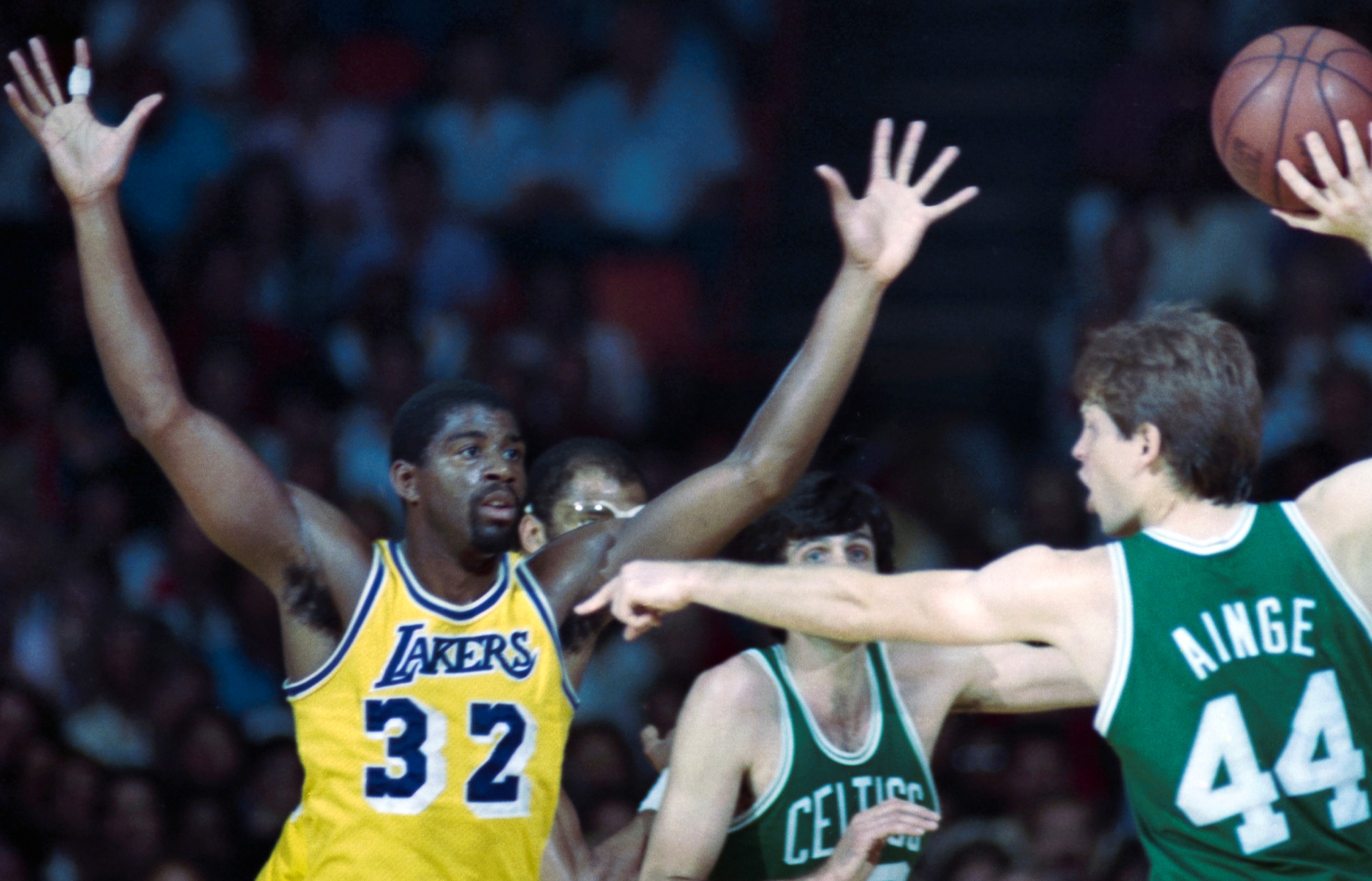 Los Angeles Lakers Magic Johnson battles Boston Celtics Danny Ainge during 1985 NBA Finals.