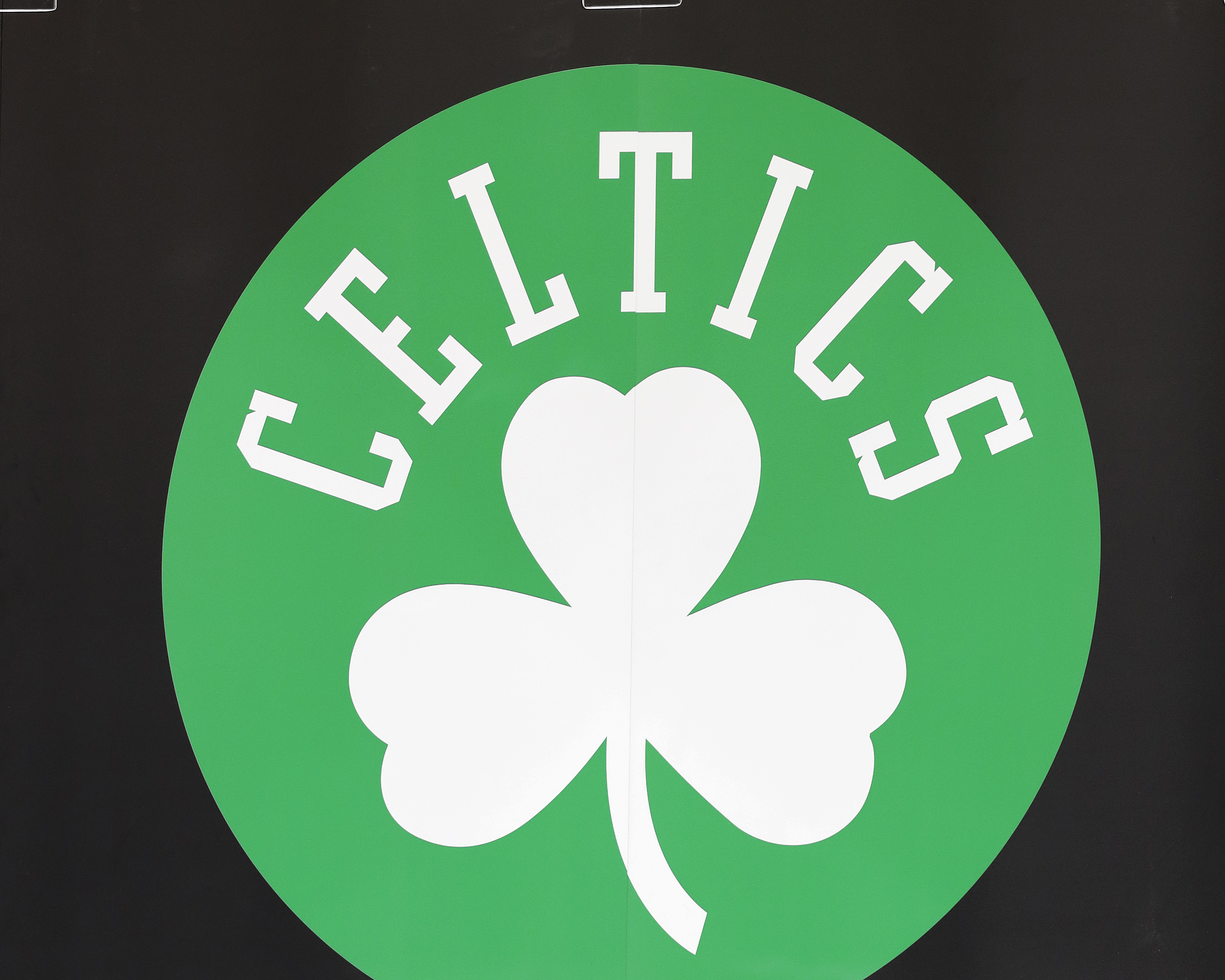 The Boston Celtics logo on the boards before the game between the Boston Celtics and the Brooklyn Nets.