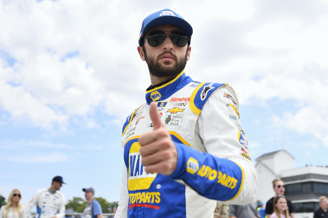 Chase Elliott gives a thumbs up before a race.