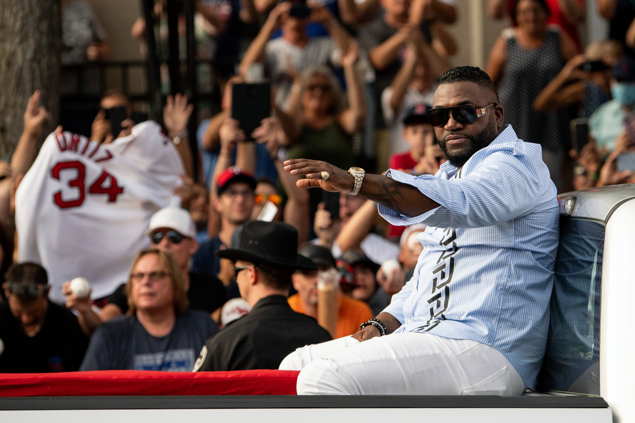 Hall of Fame Class of 2022 Inductee David Ortiz greets fans at the parade during the 2022 Hall of Fame weekend.