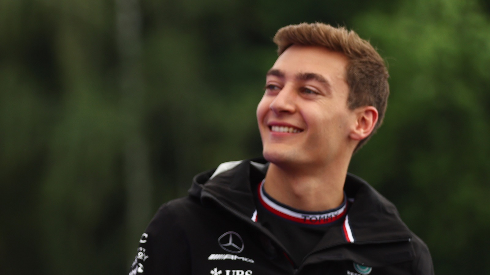 George Russell talks on the fan stage prior to practice ahead of the Formula 1 Grand Prix of Austria at Red Bull Ring on July 9, 2022, in Spielberg, Austria.