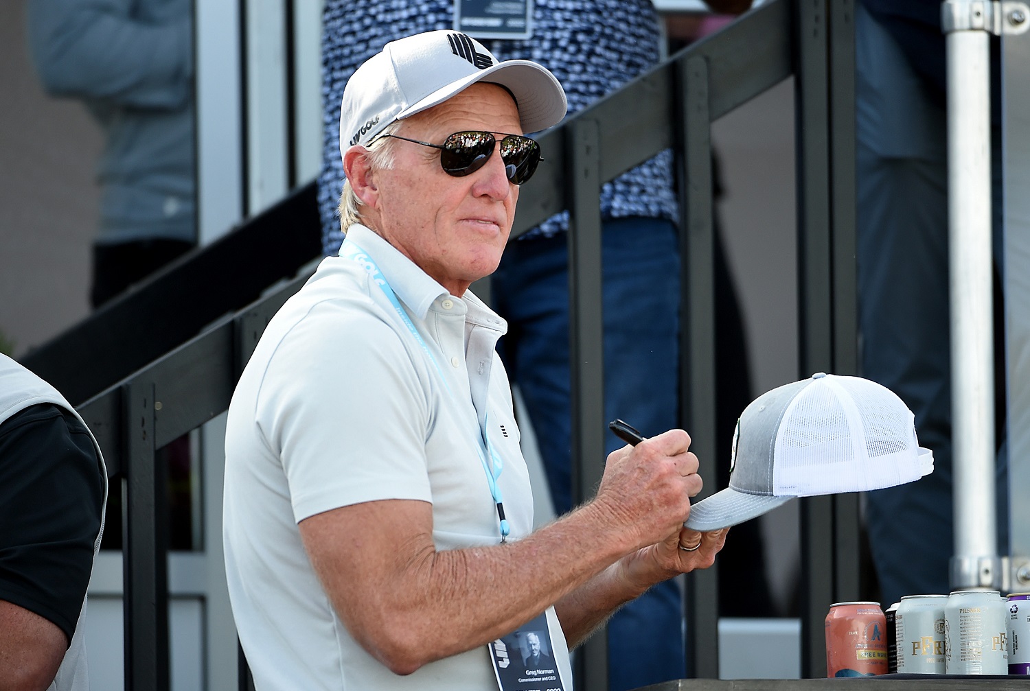 LIV Golf commissioner Greg Norman signs hats during the final round of the LIV Golf Invitational - Portland at Pumpkin Ridge Golf Club on July 2, 2022 in North Plains, Oregon.