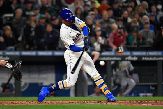 Seattle Mariners outfielder Julio Rodriguez swings at a pitch.