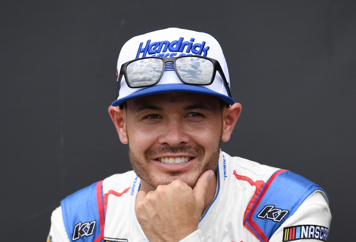 Kyle Larson looks on during pre-race activities before the running of the NASCAR Cup Series Quaker State 400 on July 9, 2022, at Atlanta Motor Speedway.