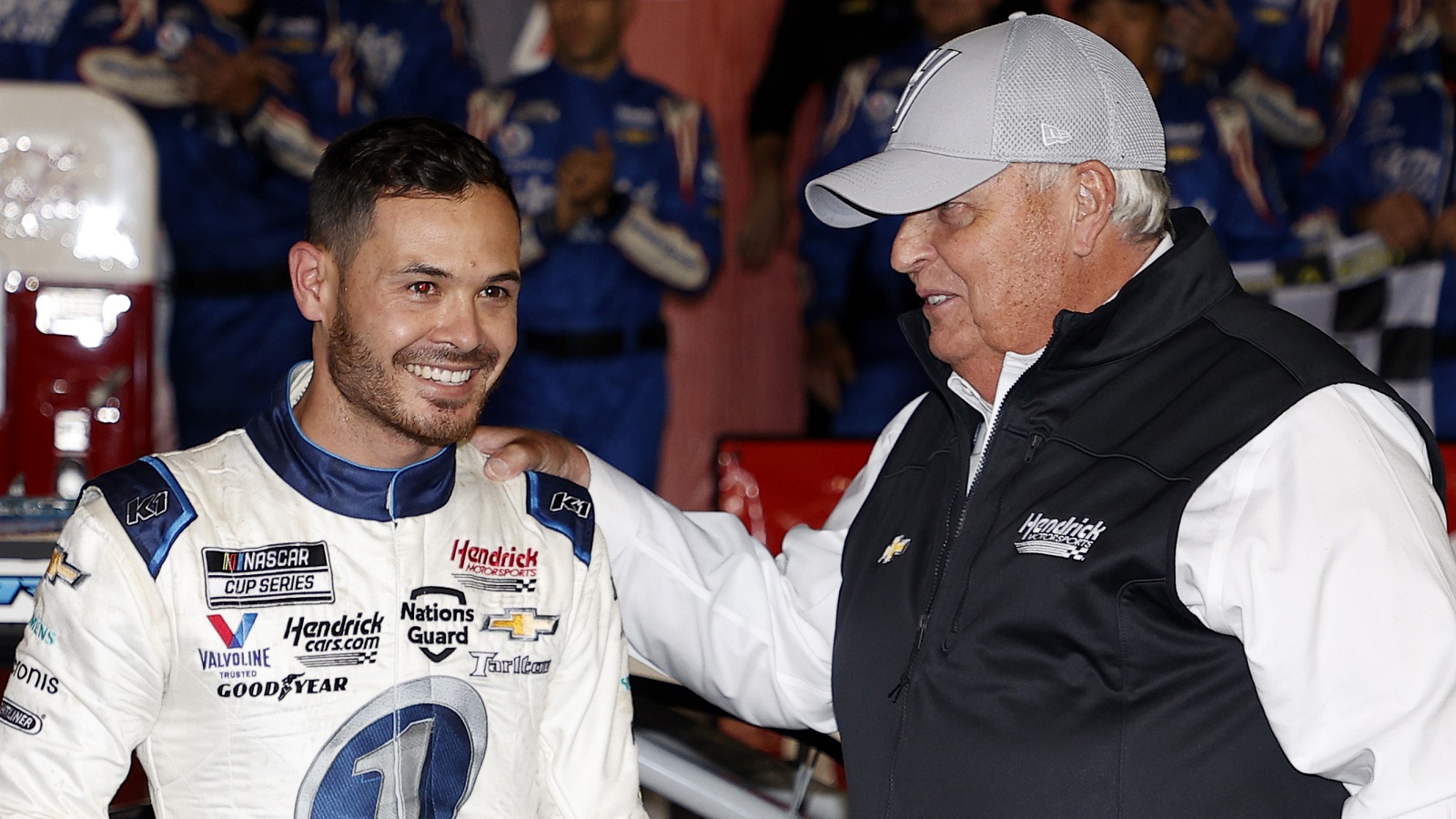 Kyle Larson and NASCAR Hall of Famer and team owner Rick Hendrick celebrate after winning the NASCAR Cup Series Coca-Cola 600 on May 30, 2021.