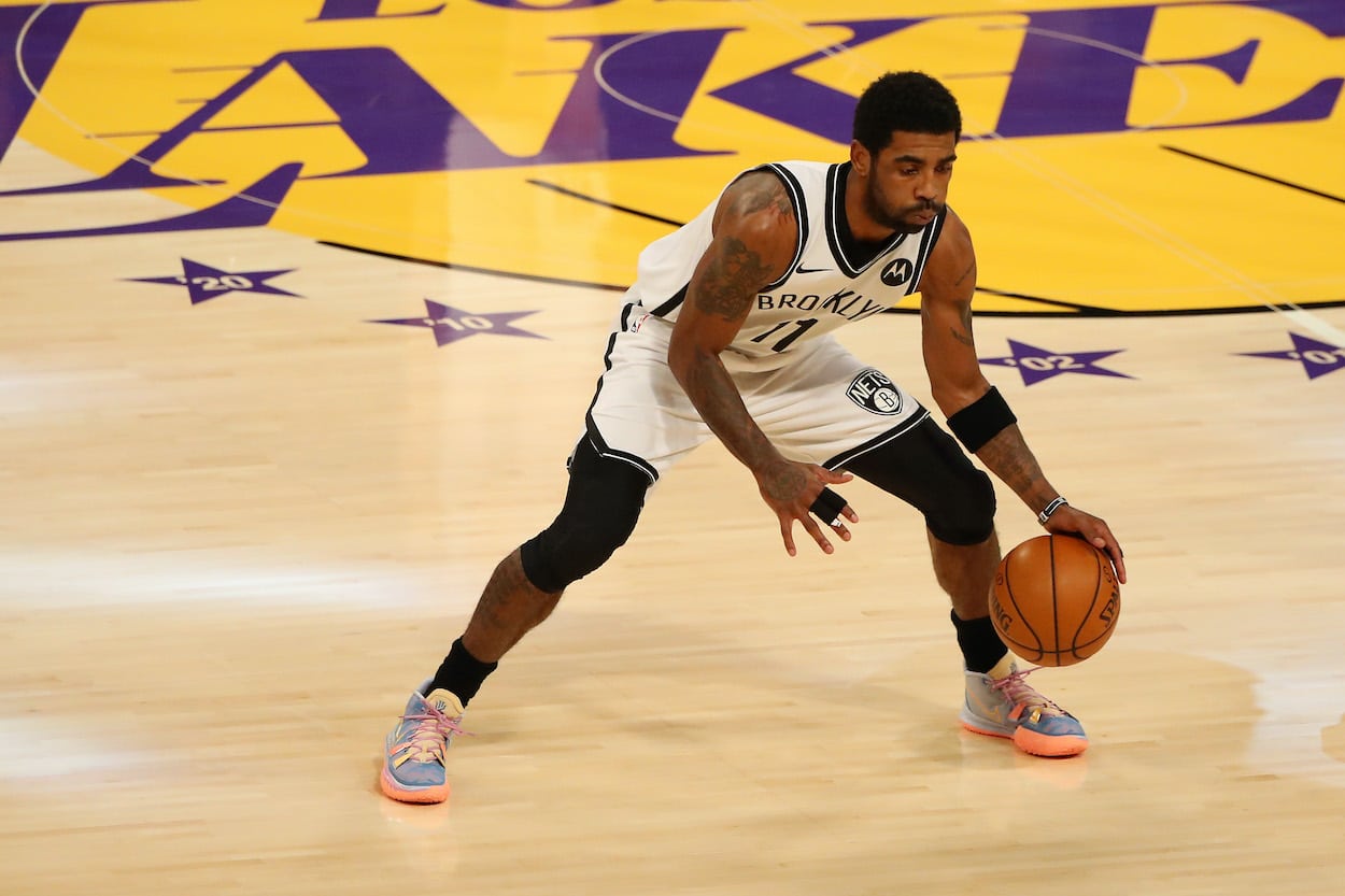 Kyrie Irving of the Brooklyn Nets dribbles the ball before the game against the Los Angeles Lakers in 2021.