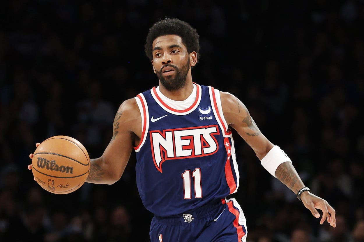 Kyrie Irving of the Brooklyn Nets dribbles during the first half against the Cleveland Cavaliers in 2022.