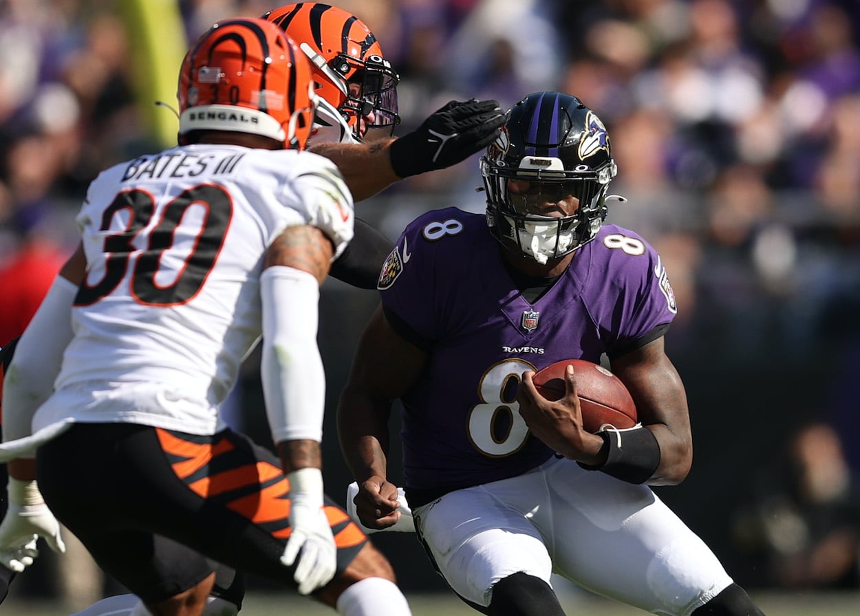 Lamar Jackson runs the ball against the Bengals.